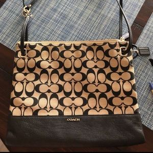 Coach tan and black medium sized shoulder purse